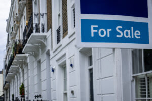 House prices unexpectedly returned to double digit growth last month as the property market kept up its "extremely buoyant" pace, new figures show.