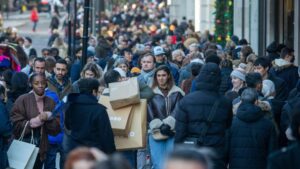 Footfall in December reached its highest level since the pandemic as shoppers headed to stores in search of Christmas gifts.
