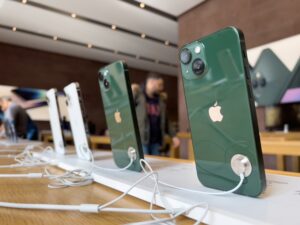 Apple sales dropped at the end of 2022 as shoppers squeezed by the rising cost of living cut back their purchases.