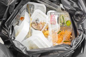 Britain's major retailers and food manufacturers are increasing their lobbying efforts to postpone significant environmental reforms that will require them to pay for the collection and recycling of household packaging waste from next year.