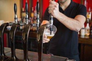 A pint of beer during the busiest periods will cost drinkers 20p more under a “dynamic pricing” system introduced by Britain’s largest pub group.
