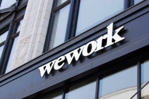 Shares in WeWork, the global office space-sharing company, have plunged after it raised "substantial doubt" about its future.